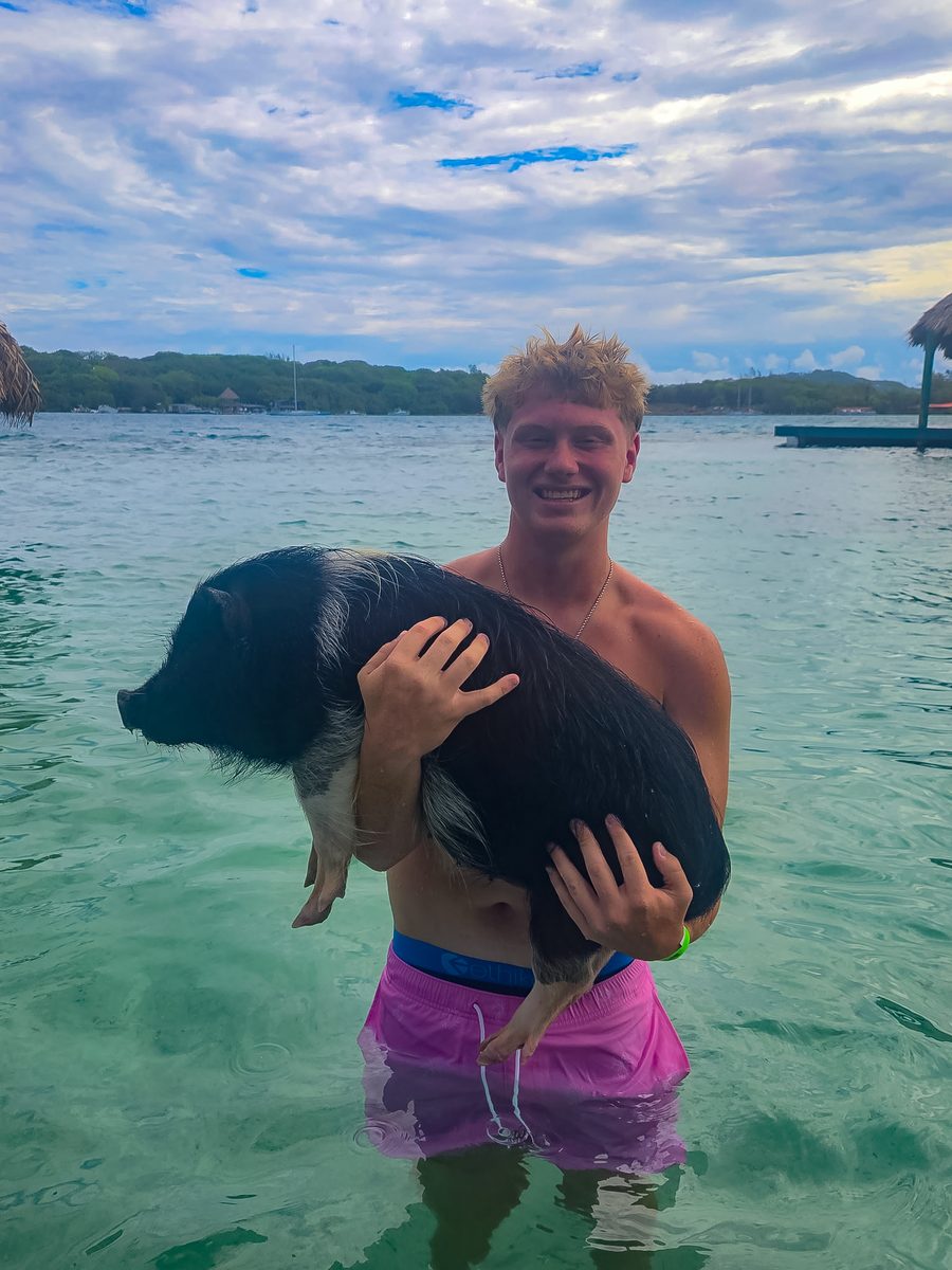 Asher Price on vacation, wading in the ocean