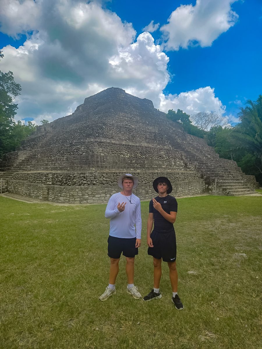 Asher Price with a friend at ancient ruins